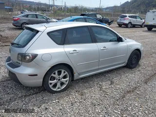 2009 Mazda Mazda3 s Touring with VIN JM1BK344591216032, listed as a IAAI auction lot 42005781 with 135,609 mi miles. Bid and sale history available at carsss.com. Image 4.