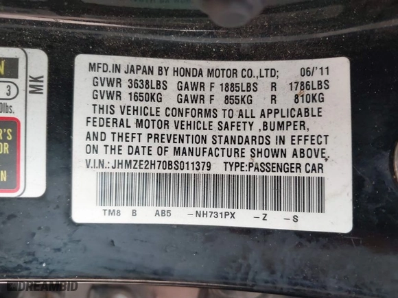 2011 Honda Insight EX with VIN JHMZE2H70BS011379, listed as a IAAI auction lot 41606111 with 220,543 mi miles. Bid and sale history available at carsss.com. Image 9.
