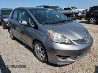 2010 Honda Fit Sport with VIN JHMGE8H41AC002070, listed as a Copart auction lot 62356565 with 148,279 mi miles and Salvage title. Bid and sale history available at DreamBid. Image 13.