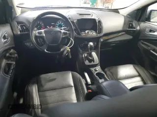 2014 Ford Escape Titanium с VIN 1FMCU0J98EUA35069, выставлен на аукционе Copart как лот 58369635 с пробегом 92 323 миль миль и Списание • Salvage title. История ставок и продаж доступна на DreamBid. Изображение 8.