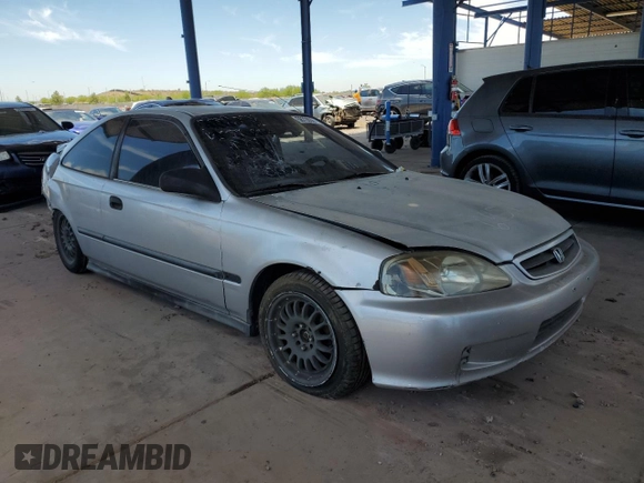 1999 Honda Civic DX with VIN 1HGEJ6125XL086017, listed as a Copart auction lot 58728564 with 262,100 mi miles and Salvage Title. Bid and sale history available at carsss.com. Image 4.