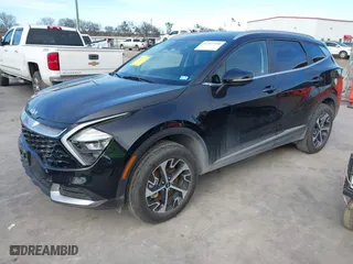2023 Kia Sportage Hybrid EX with VIN KNDPVCAGXP7084083, listed as a IAAI auction lot 41311190 with 16,064 mi miles. Bid and sale history available at carsss.com. Image 2.