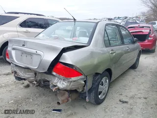 2004 Mitsubishi Lancer ES with VIN JA3AJ26E94U061750, listed as a IAAI auction lot 41262993 with 168,723 mi miles. Bid and sale history available at carsss.com. Image 4.