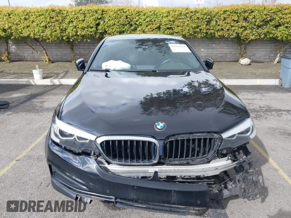 2019 BMW 5 Series 530e with VIN WBAJA9C52KB399480, listed as a IAAI auction lot 41714228 with 90,435 mi miles and . Bid and sale history available at DreamBid. Image 12.