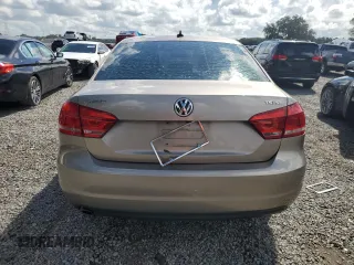 2015 Volkswagen Passat SE с VIN 1VWBS7A39FC063364, выставлен на аукционе Copart как лот 69635734 с пробегом 143 658 миль миль и Списание • Salvage title. История ставок и продаж доступна на DreamBid. Изображение 6.