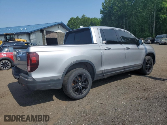2018 Honda Ridgeline RTL-E with VIN 5FPYK3F77JB014975, listed as a Copart auction lot 59798125 with 124,361 mi miles and Clean title. Bid and sale history available at DreamBid. Image 3.