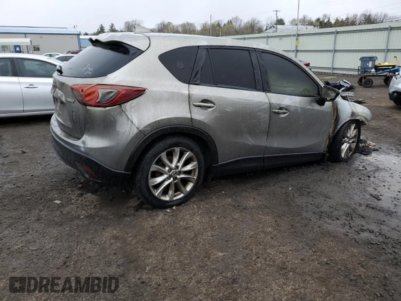 2015 Mazda CX-5 Grand Touring with VIN JM3KE4DY6F0528286, listed as a Copart auction lot 52367765 with Not Provided miles and Salvage Title. Bid and sale history available at DreamBid. Image 3.