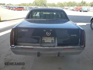 1996 Cadillac Fleetwood z VIN 1G6DW52P2TR710009, wystawiony jako Copart lot #67530934 z przebiegiem 127 910 mil mil oraz Tytuł czysty. Historia ofert i sprzedaży dostępna na DreamBid. Obrazek 6.