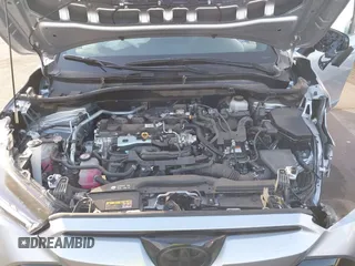 2023 Toyota Corolla Cross Hybrid S with VIN 7MUFBABG8PV011345, listed as a IAAI auction lot 41286619 with 13,518 mi miles and . Bid and sale history available at DreamBid. Image 10.