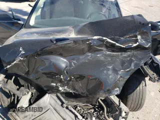 2016 Tesla Model S 90D with VIN 5YJSA1E26GF168260, listed as a Copart auction lot 48703154 with 90,567 mi miles and Salvage Title. Bid and sale history available at DreamBid. Image 11.