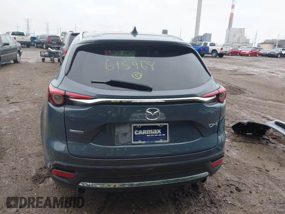 2022 Mazda CX-9 Grand Touring with VIN JM3TCBDY0N0615968, listed as a IAAI auction lot 42312159 with 22,912 mi miles and . Bid and sale history available at DreamBid. Image 16.
