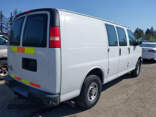 2012 Chevrolet Express Cargo Van with VIN 1GCWGFCB0C1117727, listed as a IAAI auction lot 42105038 with 204,472 mi miles. Bid and sale history available at carsss.com. Image 4.