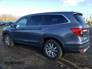 2022 Honda Pilot EX-L with VIN 5FNYF6H55NB023156, listed as a Copart auction lot 52269325 with 43,563 mi miles and Salvage title. Bid and sale history available at DreamBid. Image 2.