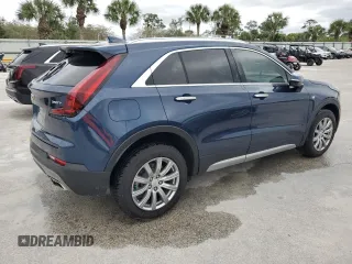 2021 Cadillac XT4 FWD Premium Luxury z VIN 1GYFZCR48MF056210, wystawiony jako Copart lot #45818245 z przebiegiem Nie podano mil oraz Nie do naprawy • Non repairable. Historia ofert i sprzedaży dostępna na DreamBid. Obrazek 3.