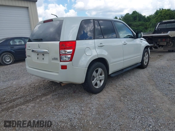 2013 Suzuki Grand Vitara Premium with VIN JS3TE0D68D4100201, listed as a IAAI auction lot 42694457 with 126,585 mi miles and . Bid and sale history available at DreamBid. Image 4.