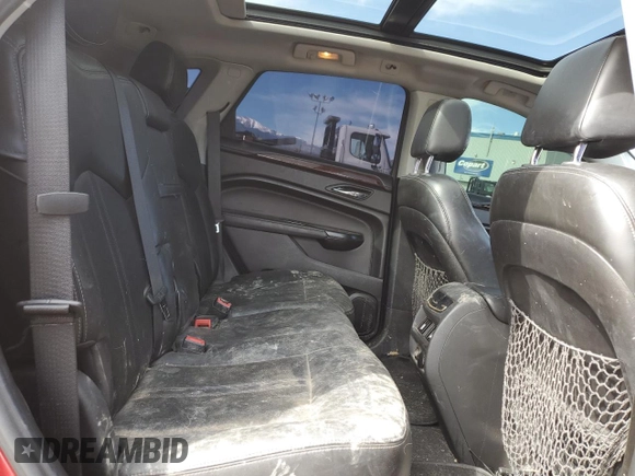 2013 Cadillac SRX Premium Collection с VIN 3GYFNJE3XDS583643, выставлен на аукционе Copart как лот 49030635 с пробегом 159 980 миль миль и Списание • Salvage title. История ставок и продаж доступна на DreamBid. Изображение 11.