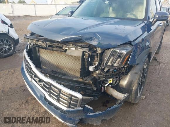 2023 Kia Telluride S with VIN 5XYP6DGC7PG374940, listed as a IAAI auction lot 42422900 with 38,813 mi miles and . Bid and sale history available at DreamBid. Image 6.