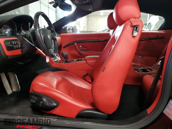 2012 Maserati GranTurismo Sport с VIN ZAM45MMA3C0061663, выставлен на аукционе Copart как лот 71174774 с пробегом 14 624 миль миль и Списание • Salvage title. История ставок и продаж доступна на DreamBid. Изображение 7.