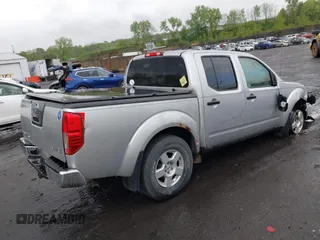 2006 Nissan Frontier SE with VIN 1N6AD07W56C434356, listed as a IAAI auction lot 42199530 with 224,148 mi miles and . Bid and sale history available at DreamBid. Image 4.
