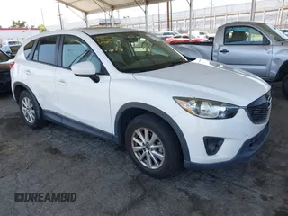 2014 Mazda CX-5 Touring with VIN JM3KE2CY3E0424889, listed as a IAAI auction lot 42643130 with 155,688 mi miles and . Bid and sale history available at DreamBid. Image 1.
