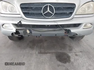 2002 Mercedes-Benz M 320/430/500 z VIN 4JGAB54E42A298255, wystawiony jako IAAI lot #42502789 z przebiegiem 134 879 mil mil oraz . Historia ofert i sprzedaży dostępna na DreamBid. Obrazek 6.