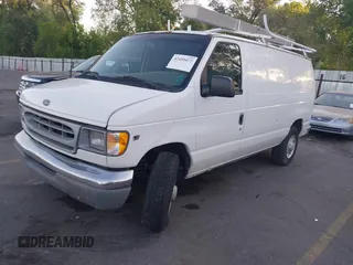 2001 Ford Econoline Cargo z VIN 1FTNE24L51HB29068, wystawiony jako IAAI lot #42495072 z przebiegiem 186 061 mil mil oraz . Historia ofert i sprzedaży dostępna na DreamBid. Obrazek 2.