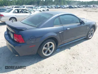 2002 Ford Mustang GT Deluxe with VIN 1FAFP42X72F103381, listed as a IAAI auction lot 42574958 with 187,018 mi miles and . Bid and sale history available at DreamBid. Image 4.