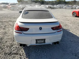 2015 BMW M6 z VIN WBS6C9C58FD467867, wystawiony jako Copart lot #75966844 z przebiegiem 94 102 mil mil oraz Szkoda całkowita • Salvage title. Historia ofert i sprzedaży dostępna na DreamBid. Obrazek 6.