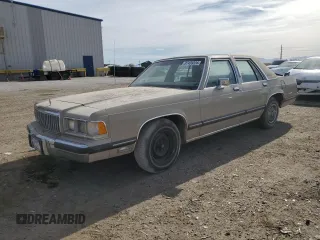 1991 Mercury Grand Marquis z VIN 2MECM75FXMX633893, wystawiony jako Copart lot #87439324 z przebiegiem 65 046 mil mil oraz Tytuł czysty. Historia ofert i sprzedaży dostępna na DreamBid. Obrazek 1.