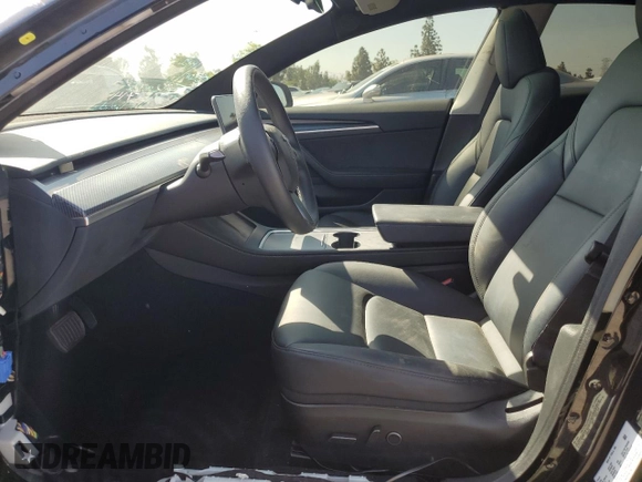 2023 Tesla Model 3 with VIN 5YJ3E1EA4PF562792, listed as a Copart auction lot 55994165 with 17,234 mi miles and Salvage title. Bid and sale history available at DreamBid. Image 7.