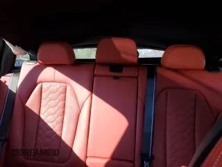 2020 BMW X4 M Competition z VIN 5YMUJ0C00L9C44560, wystawiony jako Copart lot #83274014 z przebiegiem Nie podano mil oraz Szkoda całkowita • Salvage title. Historia ofert i sprzedaży dostępna na DreamBid. Obrazek 10.