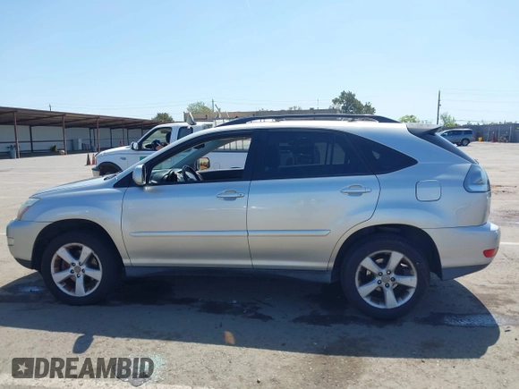 2004 Lexus RX 330 with VIN JTJHA31U340061672, listed as a IAAI auction lot 41979906 with 166,733 mi miles. Bid and sale history available at carsss.com. Image 14.