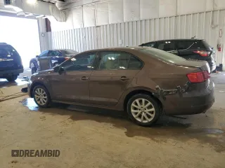 2012 Volkswagen Jetta SE z VIN 3VWDX7AJ0CM351728, wystawiony jako Copart lot #69621664 z przebiegiem 157 823 mil mil oraz Nie do naprawy • Non repairable. Historia ofert i sprzedaży dostępna na DreamBid. Obrazek 2.