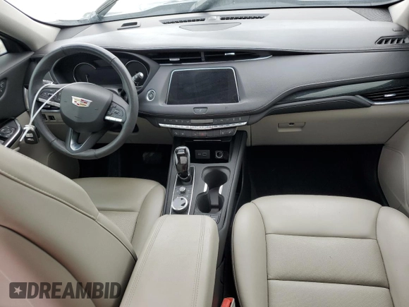 2021 Cadillac XT4 FWD Premium Luxury z VIN 1GYFZCR48MF056210, wystawiony jako Copart lot #45818245 z przebiegiem Nie podano mil oraz Nie do naprawy • Non repairable. Historia ofert i sprzedaży dostępna na DreamBid. Obrazek 8.