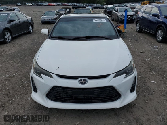 2014 Scion tC z VIN JTKJF5C70E3084411, wystawiony jako Copart lot #54255385 z przebiegiem 152 715 mil mil oraz Szkoda całkowita • Salvage title. Historia ofert i sprzedaży dostępna na DreamBid. Obrazek 5.