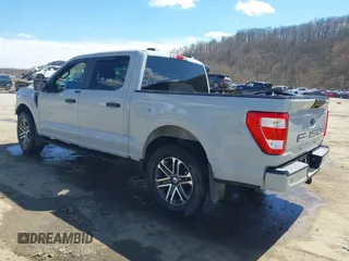 2023 Ford F-150 XL with VIN 1FTFW1E51PFB15197, listed as a IAAI auction lot 41869063 with 33,980 mi miles and . Bid and sale history available at DreamBid. Image 3.