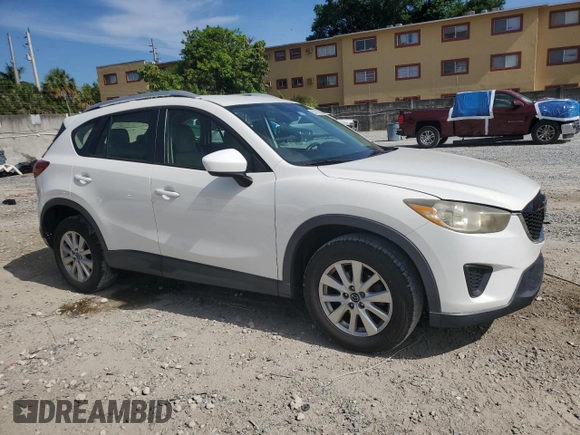 2014 Mazda CX-5 Sport with VIN JM3KE2BE9E0344990, listed as a Copart auction lot 59014145 with 126,905 mi miles and Salvage title. Bid and sale history available at DreamBid. Image 4.