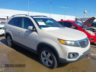 2012 Kia Sorento EX with VIN 5XYKU4A23CG205699, listed as a IAAI auction lot 41384287 with 205,303 mi miles. Bid and sale history available at carsss.com. Image 1.