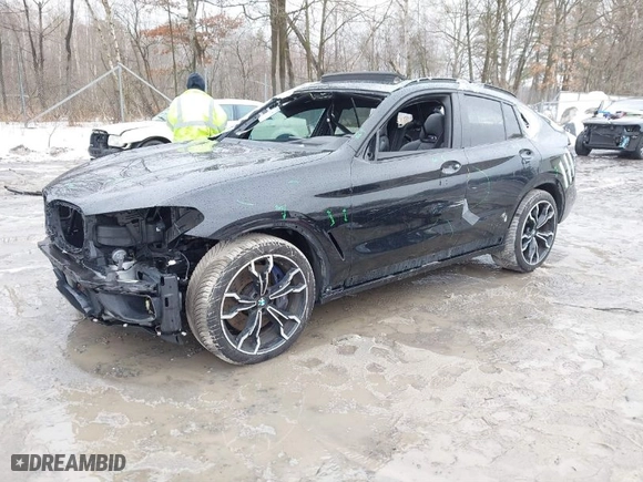 2020 BMW X4 M with VIN 5YMUJ0C01LLU67190, listed as a IAAI auction lot 41669132 with 55,609 mi miles. Bid and sale history available at carsss.com. Image 2.