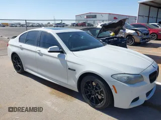 2013 BMW 5 Series 528i with VIN WBAXG5C56DD230121, listed as a IAAI auction lot 42019899 with 142,100 mi miles and . Bid and sale history available at carsss.com. Image 6.