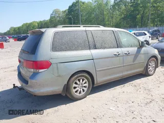 2008 Honda Odyssey EX with VIN 5FNRL38498B067068, listed as a IAAI auction lot 42041658 with 161,953 mi miles and . Bid and sale history available at DreamBid. Image 4.