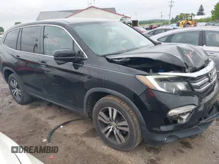 2018 Honda Pilot EX z VIN 5FNYF6H31JB066191, wystawiony jako IAAI lot #42260599 z przebiegiem 85 356 mil mil oraz . Historia ofert i sprzedaży dostępna na DreamBid. Obrazek 1.