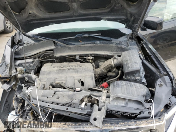 2012 Honda Ridgeline RTL with VIN 5FPYK1F5XCB455246, listed as a Copart auction lot 52871925 with 179,755 mi miles and Salvage title. Bid and sale history available at DreamBid. Image 12.