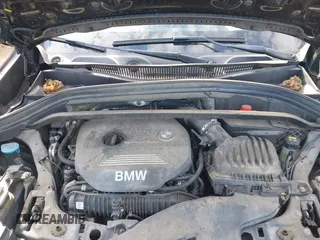 2016 BMW X1 xDrive28i with VIN WBXHT3Z3XG4A48557, listed as a IAAI auction lot 41387960 with 84,821 mi miles. Bid and sale history available at carsss.com. Image 10.