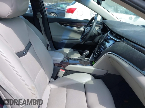 2013 Cadillac XTS Luxury z VIN 2G61P5S33D9170453, wystawiony jako IAAI lot #41928607 z przebiegiem 68 094 mil mil oraz . Historia ofert i sprzedaży dostępna na DreamBid. Obrazek 5.