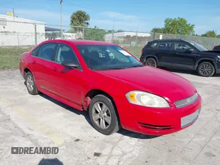 2013 Chevrolet Impala LS with VIN 2G1WF5E34D1182247, listed as a IAAI auction lot 41804009 with 247,585 mi miles and . Bid and sale history available at DreamBid. Image 1.