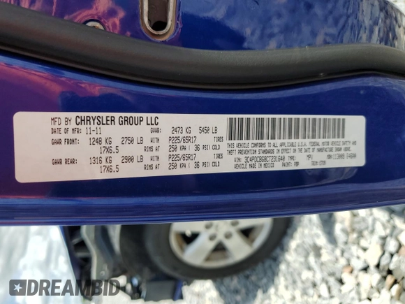 2012 Dodge Journey SXT with VIN 3C4PDCBG8CT231640, listed as a Copart auction lot 60625465 with 131,358 mi miles and Salvage title. Bid and sale history available at DreamBid. Image 14.