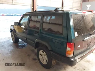 1997 Jeep Cherokee Sport with VIN 1J4FJ68S9VL594152, listed as a IAAI auction lot 41732573 with 65,316 mi miles. Bid and sale history available at carsss.com. Image 3.