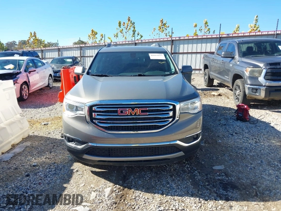 2019 GMC Acadia SLE z VIN 1GKKNLLS1KZ262878, wystawiony jako IAAI lot #40863657 z przebiegiem 79 402 mil mil oraz . Historia ofert i sprzedaży dostępna na DreamBid. Obrazek 12.