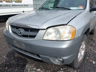 2001 Mazda Tribute LX with VIN 4F2YU08151KM06561, listed as a IAAI auction lot 41478779 with 54,826 mi miles and . Bid and sale history available at DreamBid. Image 6.